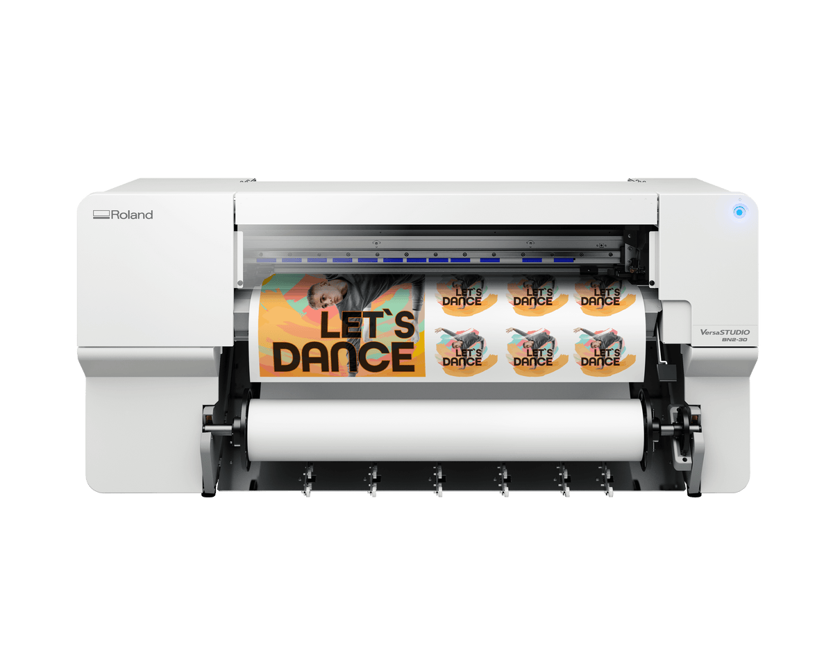 Roland BN2-30 desktop printer and cutter showcasing vibrant printed designs and a user-friendly interface.