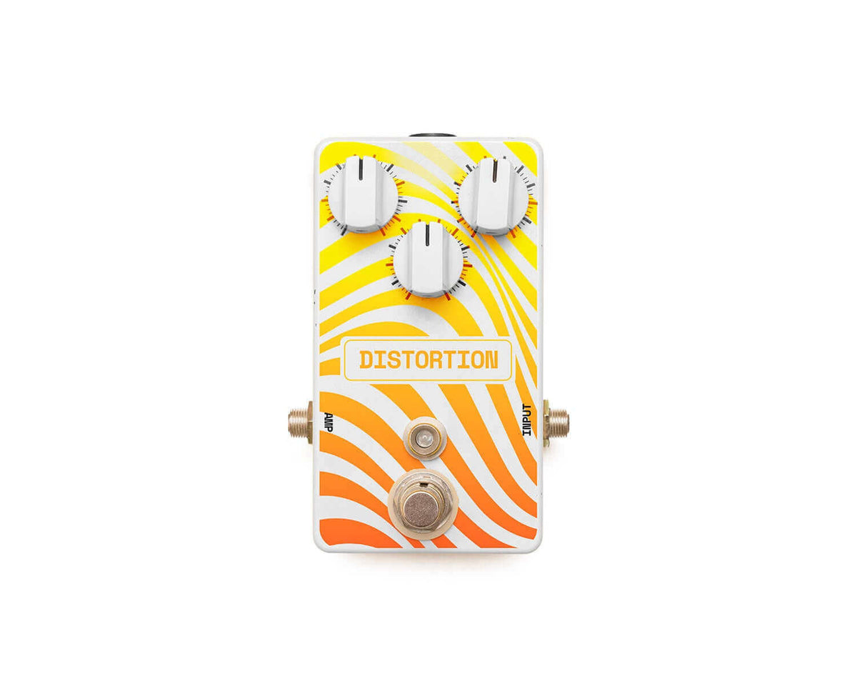 Colorful guitar distortion pedal with three knobs and a vibrant design.